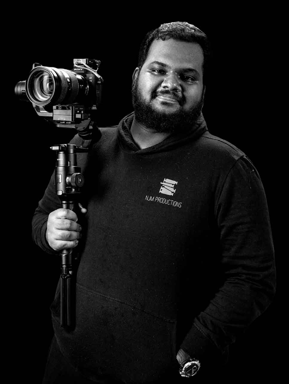 Nelson Joseph holding a camera stabiliser