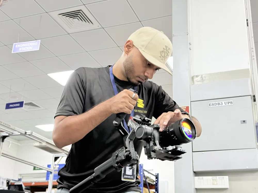 An NJM camera operator preparing for a shoot