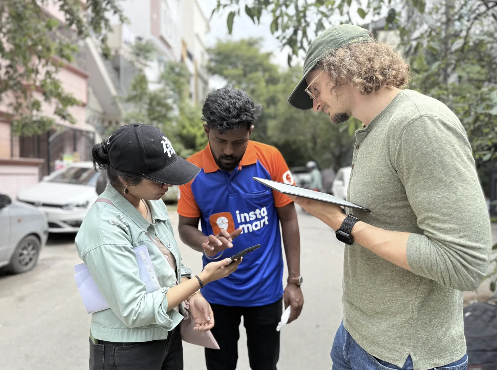 An international production team planning a shot on location in India